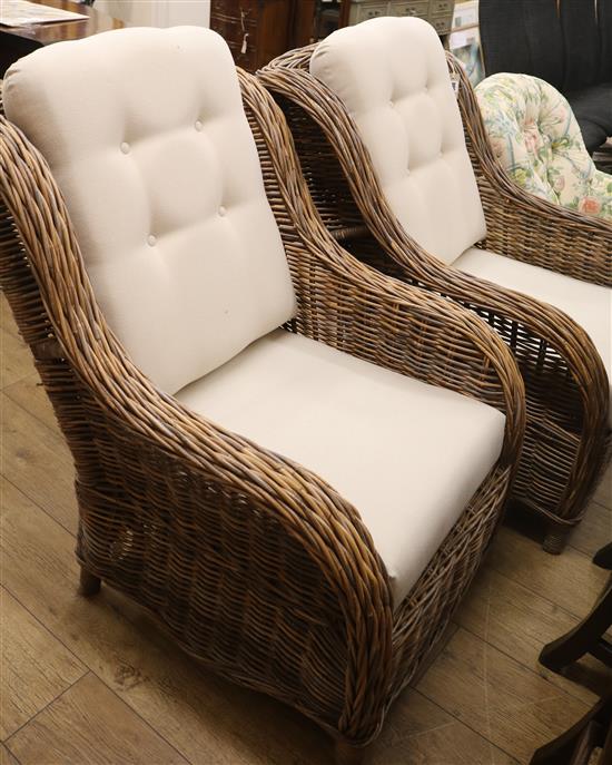 A pair of canework armchairs